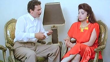 نبيلة عبيد ومحمود حميدة في مشهد من فيلم سمارة الأمير