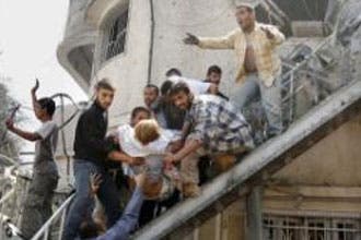 حماس تصر على المشاركة في أي حكومة فلسطينية وترفض الاستفتاء