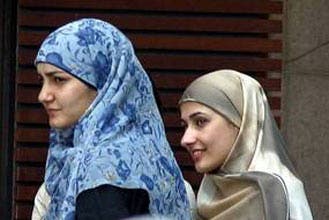 Belgian schools ban Muslim veil in classes