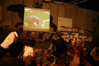 Israeli separation wall becomes huge TV screen
