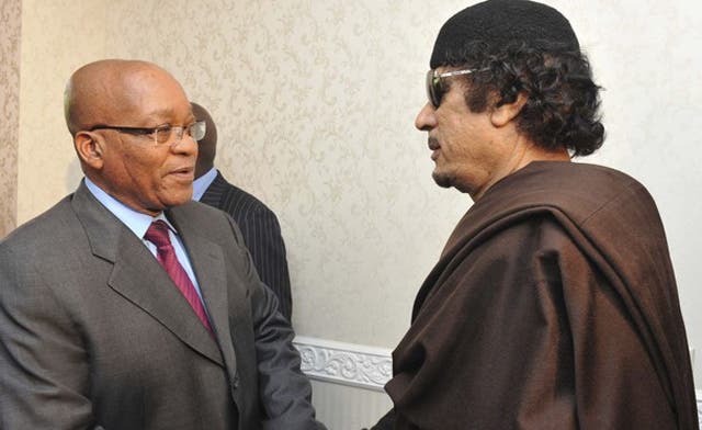 Qaddafi appears on TV greeting Zuma and has a French lawyer to his defense