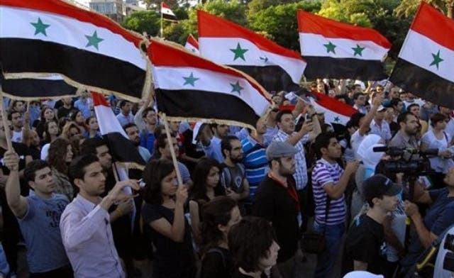 Protesters in Syria commerce capital Aleppo urge Assad exit