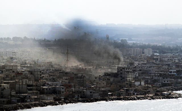 Syria's death toll reaches 30 as ships, tanks blast neighborhoods in ...