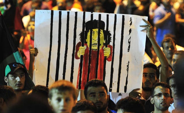 Libyan rebels celebrate victory in Tripoli, reports say Qaddafi still in capital