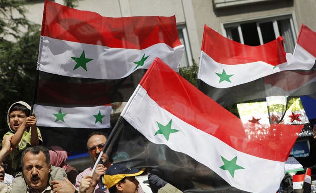 Syrian protesters chant ‘Bye Qaddafi, Bashar next’ as tanks enter eastern town