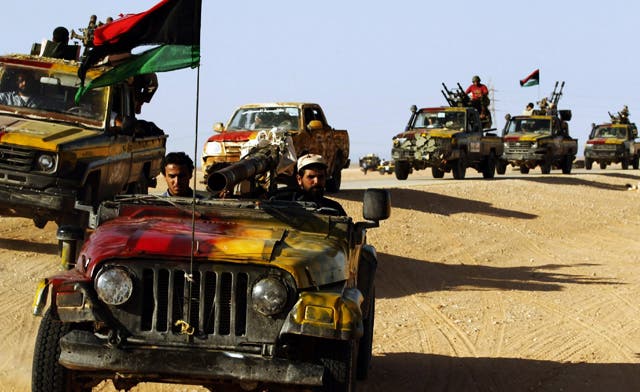 Libya’s revolutionary fighters enter Qaddafi hometown Sirte, fight his ...