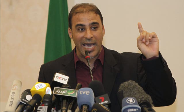 Qaddafi spokesman Mussa Ibrahim captured outside Sirte ‘dressed as a woman’