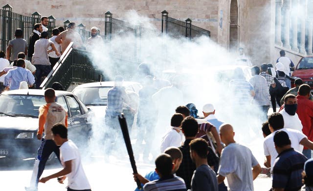 Tunisia police teargas protest at ‘blasphemous’ TV station; TV boss says his home attacked