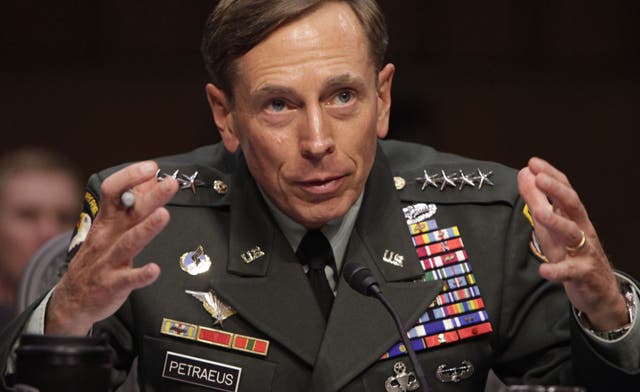 Petraeus denies imposing military view on CIA analysts