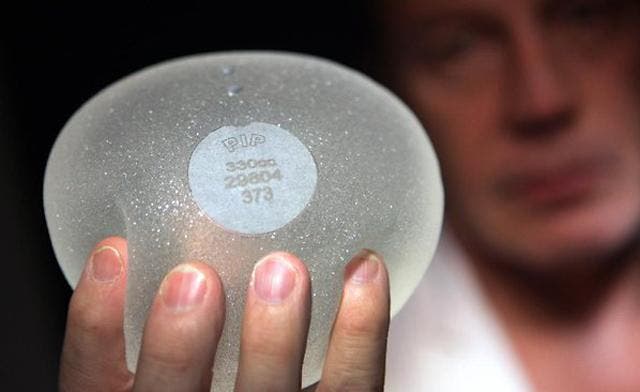 French breast implant tycoon hits back as scandal grows