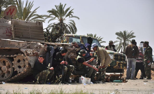 Fresh clashes erupt in western Libya between former rebels, killing 26