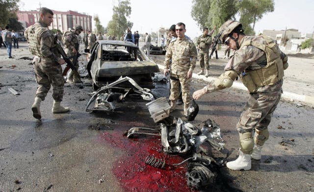 Fourteen people killed and 39 injured in bombings across Iraq