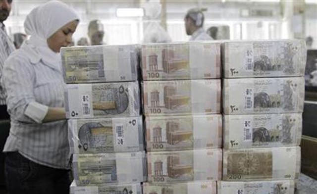 Syria prints new money in Russia as deficit grows