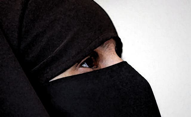 Muslim mother banned from British school over face veil