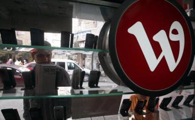 Kuwait’s Wataniya Q2 profit halves, hit by Algeria currency loss