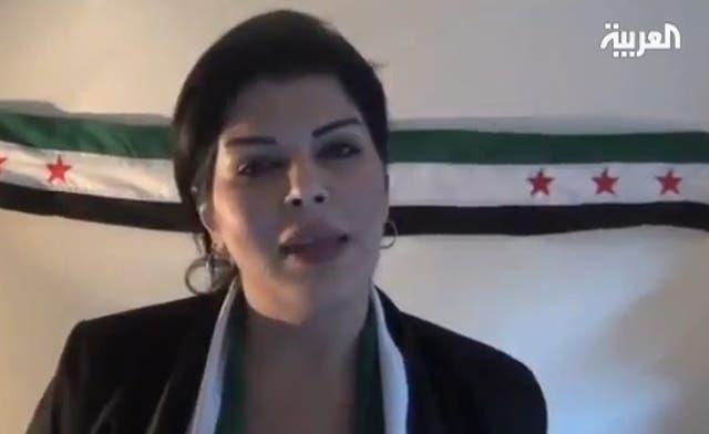 Syrian TV presenter defects, says Assad trying to provoke sectarianism