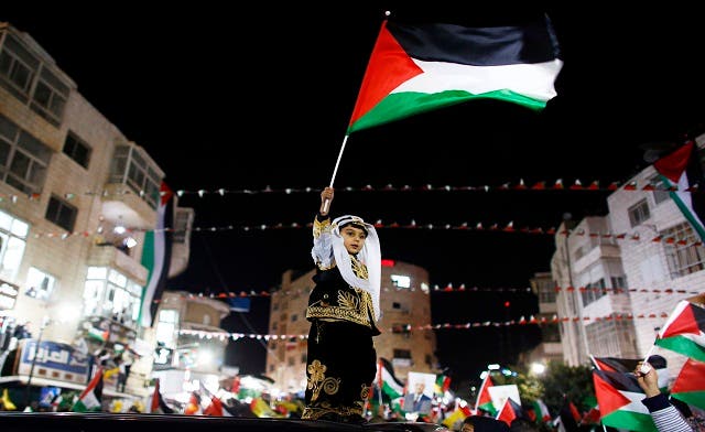 Cheers erupt among Palestinian crowds as U.N. bid approved