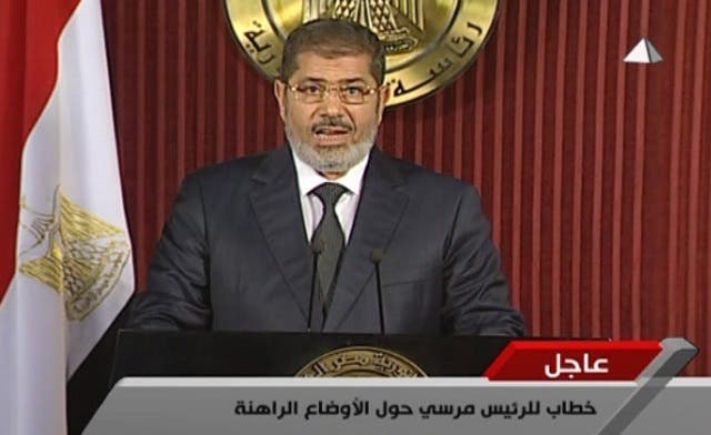 Egypt’s Mursi calls for dialogue, makes concession to opponents