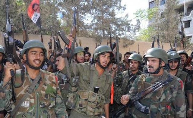 Two more Syrian generals and three state journalists defect